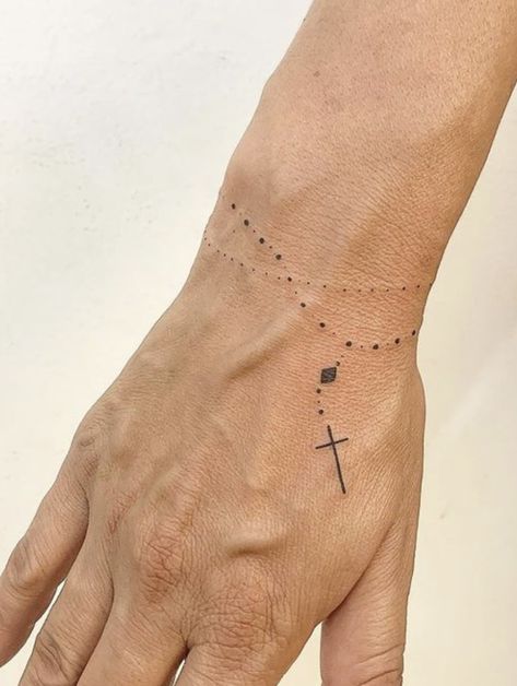 #tattoo Minimalist Rosary Tattoo, Rosary Wrist Tattoo For Women, Rosary Tattoo Wrist Woman Crosses, Dainty Religious Tattoos, Catholic Symbols Tattoo, Rosary Bracelet Tattoo, Finger Rosary Tattoo, Rosary Tattoo For Women, Rosary Tattoo For Men