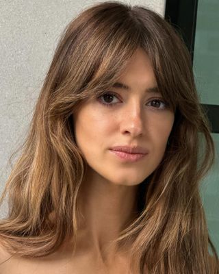 Daisy Edgar-Jones's "Boho Fringe" Just Became Summer's Biggest Hair Trend Mandy Moore Curtain Bangs, 90s Fall Hair, Celebrities With Curtain Bangs, Kaia Gerber Bangs, Low Curtain Bangs, Curtain Bangs Light Brown Hair, Shoulder Length Brown Hair With Layers, Mid Length Wavy Haircut, Cowgirl Haircut