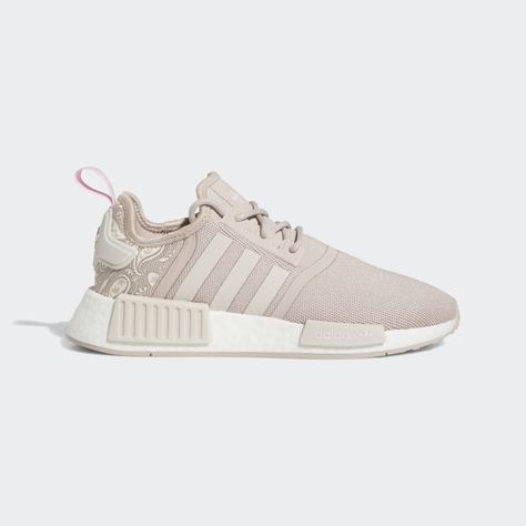 The adidas NMD_R1 has shaped the modern streetwear scene. Ever since it debuted back in 2015, the silhouette has gained global appeal and countless variations. A testament to timeless design, this pair highlights the strengths of the knit textile upper with a paisley print look. All the technical aspects including the responsive BOOST cushioning continue to set the standard for what comfort is meant to be. This shoe's upper is made with a high-performance yarn which contains at least 50% Parley Expensive Things, Modern Streetwear, Adidas Athletic Shoes, Reading Area, Adidas Nmd R1, Nmd R1, Adidas Shop, List Ideas, Shoes Brown