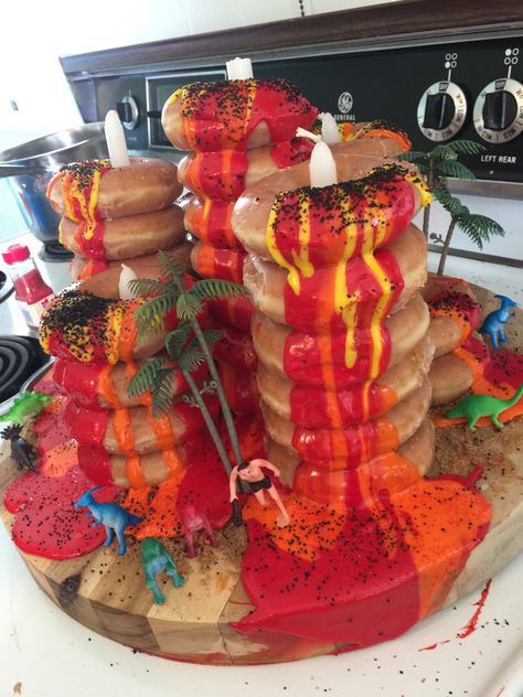 Volcano Doughnut Cake Floor Is Lava Party Food, Floor Is Lava Birthday Cake, The Floor Is Lava Birthday Cake, Donut Volcano Cake, Dinosaur Volcano Birthday Party, Floor Is Lava Birthday Party, Volcano Birthday Party, Dino Volcano Cake, Volcano Birthday Cakes For Boys