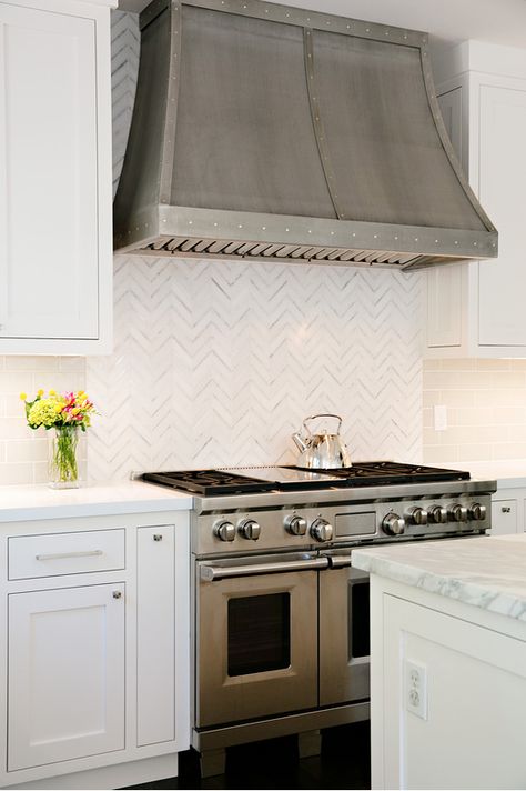 Gorgeous and simple herringbone tile pattern for a backsplash. I also love the range and venting system. Backsplash Herringbone, White Cupboards, Herringbone Backsplash, Kitchen Hoods, Kitchen Farmhouse, Backsplash Ideas, Range Hoods, Kitchen Redo, White Kitchen Cabinets