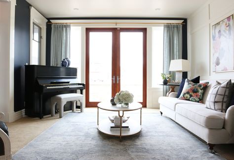 Inside a Polished Living Room With Perfect Pops of Color | DomaineHome.com Piano Small Living Room, Piano In Living Room, Piano Corner, Casual Living Room Design, Piano Living Rooms, Family Friendly Living Room, Warm Industrial, Piano Decor, Living Room Furniture Layout