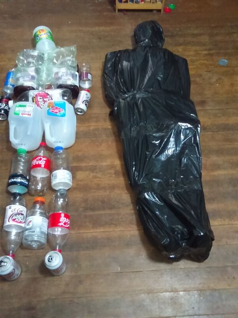 Inside Halloween Party Decorations, Trash Decoration Ideas, Mystery Decoration Ideas, Monster Mash Halloween Party Adults, Haunted House Decoration Ideas, Halloween Trash Bag Ideas, Trash Bag Body Halloween, Halloween Decor Table Ideas, Apocalypse Halloween Decor