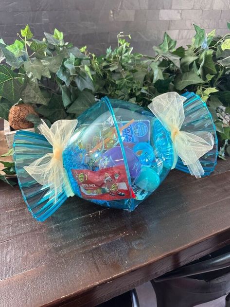 Fun Way To Wrap Any Gift! Wrapped Candy Crafts, Candy Theme Gift Wrapping, Wrapping Tube Shaped Gifts, Cheap Multi-strand Wrap Bracelet As Gift, Colorful Multi-strand Wrap Bracelet As Gift, Practical Housewarming Gifts, Fun Easter Treats, Reuse Plastic Bottles, Candy Decorations