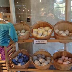 Yarn Display, Haberdashery Shop, Bushel Baskets, Yarn Storage, Store Interiors, Wool Shop, Baby Milk, Yarn Inspiration, Yarn Store