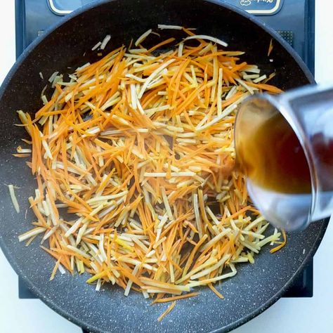 Stir fried to perfection, Kinpira Gobo is a delicious Japanese side dish of carrot and burdock root in a sauce of soy, mirin and sake. Vegan friendly too! Carrot Stir Fry, Japanese Side Dish, Asian Side Dishes, Burdock Root, Stir Fry Sauce, Stir Fry, Vegan Friendly, Side Dish, Sake