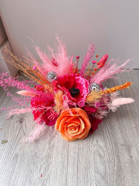 This Wedding Centerpieces item by BohoBackdropsUK has 79 favorites from Etsy shoppers. Ships from United Kingdom. Listed on Sep 16, 2024 Flower Bouquet Table Decoration, Floral Arrangement With Feathers, Disco Garden Party Decorations, Disco Ball Bouquet, Pink And Orange Florals, Hot Pink Wedding Decorations, Pink And Orange Table Setting, Disco Ball Flower Arrangements, Pink And Orange Flower Arrangements