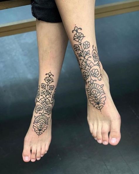 #CoolTattoos #TattooArt #InkMaster #TattooDesigns #InkedUp #TattooLovers #InkInspiration #TattooIdeas #CreativeInk #TattooStyle Both Feet Tattoos For Women, Feet Ornamental Tattoo, Rangoli Tattoo, Ornamental Feet Tattoo, Ornamental Ankle Tattoo, Ornamental Tattoo Leg, Ornamental Foot Tattoo, Front Ankle Tattoos, Ornamental Tattoo Design