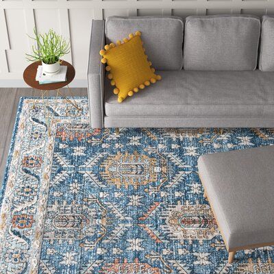 This area rug features a classic pattern and purposeful fading for a boho look. It's power-loomed from polypropylene thats' stain-resistant for everyday use. The design features traditional Oriental rug motifs with fun florals and geometric shapes. The blue, ivory, and light brown color palette is rich but distressed for a relaxed, vintage-inspired feel. We love the medium 0.5'' pile height that provides plenty of cushion - great for cozy spaces like your bedroom or den. Roll it out with a rug p Brown Color Palette, Nursery Furniture Sets, Persian Pattern, Rocker Recliners, Teen Bedding, Brown Area Rug, Medallion Design, Blue Square, Brown Area Rugs