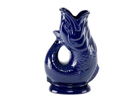 Makes a fun “glug glug” sound when you pour water out. Gluggle 38-ounce ceramic jug in blue, $50, giftwarebywade.com Wine Carafe, Ceramic Jug, Coffee Milk, Water Jug, Fish Shapes, Stoke On Trent, Fish Design, Sea Green, Home Wall Decor