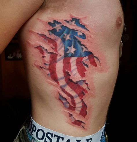 Flag skin tear American Flag Rib Tattoo, Rib Cage Tattoos For Men, Flag Tattoo Design, Tear Tattoo, Skin Tear Tattoo, Skin Tear, Scratch Tattoo, Lincoln Portrait, Ripped Skin Tattoo