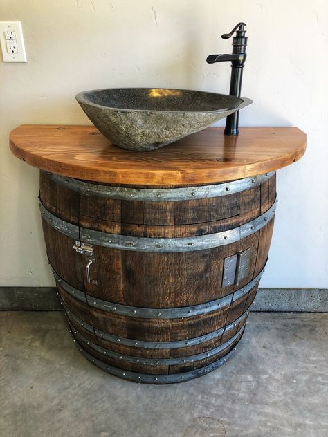 My wine barrel vanity; made from a 500 liter barrel with river stone sink. Wine Barrel Vanity, Whiskey Barrel Sink Bathroom, Wine Barrel Sink Bathroom, Barrel Sink Bathroom, Wine Barrel Sink, Wood Barrel Planters, Whiskey Barrel Sink, Barrel Sink, Stone Cabin