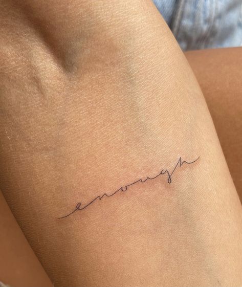 Cursive Minimalist Tattoo, Tattoo Ideas Female Self Worth, Enough Cursive Tattoo, Cursive Fine Line Tattoo Font, Tattoo Below Elbow Crease, Minimalist Tattoo For Healing, Tiny Cursive Tattoo, Dainty Word Tattoos For Women, Minimalist Tattoo Font