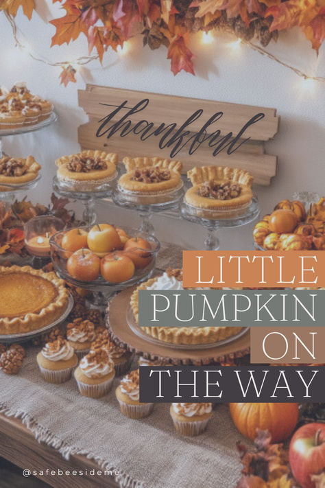 A Thanksgiving-themed baby shower dessert table decorated with mini pies, cupcakes, pumpkins, and fall leaves. Text overlay reads 'Little Pumpkin on the Way.' The setup is cozy and festive, perfect for celebrating a baby on the way during Thanksgiving. *We may earn a small commission from your purchase. Fall Themed Desserts, Wood Decor Wall, Little Pumpkin On The Way, Pumpkin On The Way, Thanksgiving Baby Shower, Wood Block Signs, Home Decor Farmhouse Style, Block Signs, Cozy Fall Decor