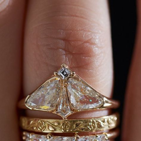 ARTËMER on Instagram: "Romantic stack featuring the Moth ring, rose patten band and half moon frills 🦋 🌹🌗 ⠀⠀⠀⠀⠀⠀⠀⠀⠀ #diamondring #engagementring #finejewelry #alternativebride #bridal #wedding  #artemerstacks  #weddingring  #ringset #ringstack #stackingrings #bridalringset #weddingset #weddingrings #weddingringset #halfmoondiamond #trilliondiamond #carrediamond #embossed #embossedgold #rose #moth #natureinspired #beautyofnature🍃 #beautyofnature" Moth Diamond Ring, Moth Diamond Engagement Ring, Exlectic Engagement Ring, Moth Wedding Ring, Bug Wedding Rings, Moth Engagement Ring, Unique Fine Jewelry, Unusual Engagement Ring, Maximalist Wedding Ring