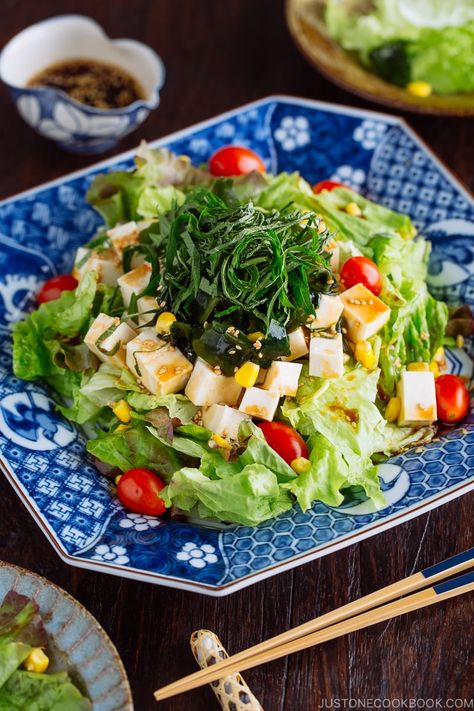 This easy Japanese Tofu Salad with Sesame Ponzu Dressing is a refreshing salad with leafy greens, tofu, corn, wakame seaweed, and fragrant Japanese herb – shiso leaves.  You’ll love the tangy ponzu sauce too. It is super easy to make and goes well with many Japanese and Asian dishes. So make a big batch! #salad #tofusalad #vegetarian | Easy Japanese Recipes at JustOneCookbook.com Japanese Salad Dressing, Japanese Tofu, Vegetarian Japanese, Japanese Salad, Just One Cookbook, Tofu Salad, Easy Japanese Recipes, Resep Salad, Mapo Tofu