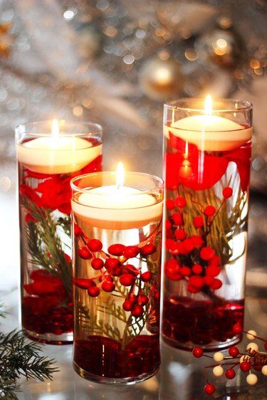 DIY Floating Holiday Candles | eHow Christmas Party Centerpieces, Christmas Candle Centerpiece, Elegant Christmas Decor, Christmas Table Centerpieces, Christmas Tablescape, Reading Nooks, Christmas Centerpiece, Christmas Tablescapes, Christmas Table Settings