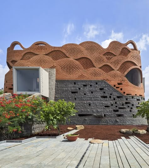 PMA Madhushala wraps Indian home in perforated wall of brick and stone Small Fortress, Ikea Sofas, Shigeru Ban, Brick Decor, Indian Home Design, Rural House, Internal Courtyard, Brick Architecture, Brick Facade