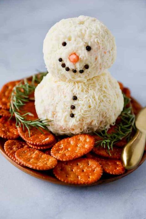 The Best 50 Christmas Appetizers » Lady Decluttered Christmas Snowman Charcuterie Board, Snowman Cream Cheese Ball, Cheese Snowman Appetizer, Boursin Cheese Ball Snowman, Best Christmas Appetizers Holidays, Cute Christmas Food Ideas Appetizer Recipes, Festive Christmas Cheese Ball, Snow Man Cheese Ball Recipes, Boursin Cheese Snowman