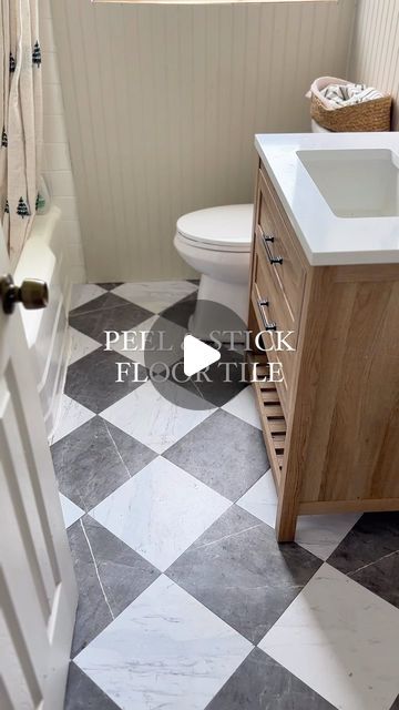 Nattie Jo Powell on Instagram: "Comment “TILE” and I’ll send you the link🔗 to these gorgeous peel & stick floor tiles!!  This is by far my favorite diy bathroom upgrade we’ve done and I love when a project is both budget friendly and holds up well!   #peelandstick #peelandstickflooring #bathroommakeover #renterfriendly #diy" Peel And Stick Flooring Laundry Room, Bathroom Remodel Peel And Stick Tile, Grout Peel And Stick Floor Tile, Renter Friendly Bathroom Floor, Bathroom Floor Stick On Tile, Peel And Stick Floor Tile Bathroom Diy, Stick On Floor Tiles Bathroom, Diy Bathroom Floor Peel And Stick, Floor Pops Peel And Stick Bathroom