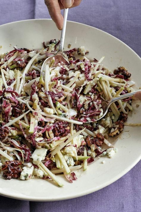 Ina Garten's French Bistro Salad is made with radicchio, Belgian endives, Granny Smith apples, Roquefort cheese, caramelized walnuts, and a tangy Dijon mustard vinaigrette. This easy French Bistro Salad recipe creates a delicious salad that takes about 20 minutes to prepare and can serve up to 4 people. French Bistro Salad, Bistro Salad, Caramelized Walnuts, Belgian Endive, Roquefort Cheese, Homemade Dressings, Mustard Vinaigrette, Homemade Dressing, Cheese Salad