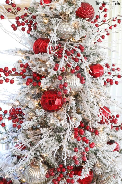 Flocked Christmas tree with red and silver ornaments. #christmas #tree #flocked #red #silver #white #ornaments Red And Silver Christmas Tree, Christmas Tree Inspiration Red And Gold, Red And Silver Christmas, Red Christmas Decor, Silver Christmas Decorations, Flocked Christmas Trees Decorated, Elegant Christmas Trees, Silver Christmas Tree, A White Christmas