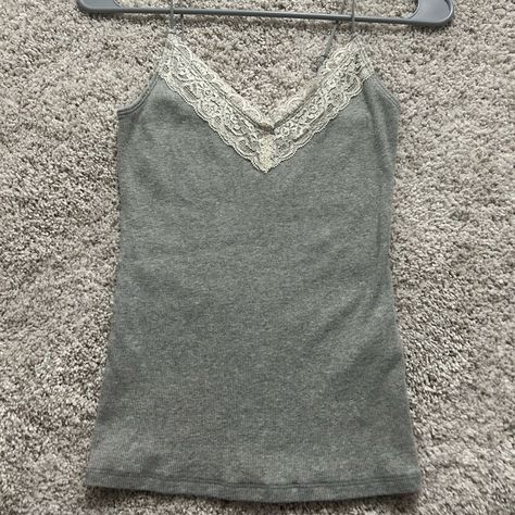 Never Worn (Took Tags Off), Grey Hollister Tank Top. Spaghetti Straps, Lace Trimming At The Top, Adjustable Straps, Excellent Condition! Size S. Grey Spaghetti Strap Top, Y2k Grunge Tops, 2000 Tops, Hollister Outfits, 2000s Tank Top, Early 2000s Outfits, Gilmore Style, Lace Tank Tops, Rory Gilmore Style