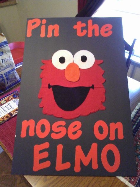 homemade "Pin the Nose on Elmo" game for Ella's Elmopalooza! Elmo Birthday Party Games Activities, Elmo Crafts For Toddlers, Elmo Games, Seaseme Street Birthday Party, Sesame Street Birthday Party Ideas Boy, Elmo Birthday Party Boy, Elmo First Birthday, Elmo And Friends, Cookie Monster Birthday