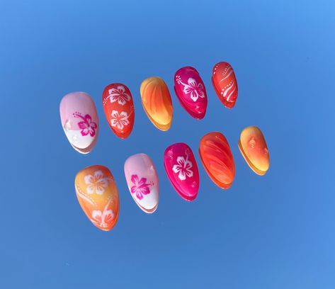 **PLEASE READ FOR IMPORTANT INFO AND SIZING** Stunning nails with cute hibiscus flowers, beautiful gradients in bright summer colors, and intricate 3D water details. They bring the Hawaiian surfer girl vibes and are perfect for your next beach holiday! Made using high-quality British and Korean gels on Aprés tips, these nails are reusable and come with all the bits you need to apply them perfectly. WHATS INCLUDED: 10x Press on Nails 12x Sticky Glue Tabs 1x Nail Glue 1x Nail Buffer 1x Manicure St Magenta Nails Design Short, Beach Vibe Nails Almond, Beach Orange Nails, Pink And Orange Hawaiian Nails, Summer Nails Press On, Hibiscus Flower Nails Orange, Summer Beach Nails Short, Spain Summer Nails, Pink And Yellow Summer Nails