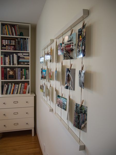 Embracing Simplicity: DIY Clothesline Photo Wall Display Photo Wall Kitchen, Photo Hanging Ideas, Clothesline Photo Display, Diy Clothesline, Diy Photo Displays, Photo Clothesline, Hanging Pictures On The Wall, Picture Display Wall, Photo Wall Hanging