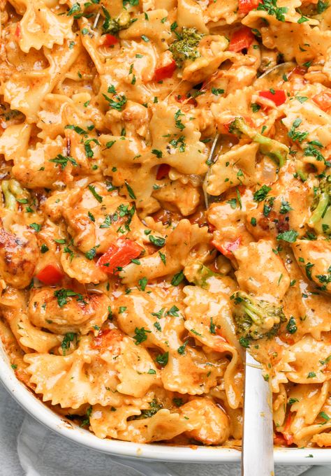 Cajun Pasta Casserole, Cajun Pasta Casserole Recipes, Baked Cajun Pasta, Lousianna Cajun Chicken Pasta Cheesecake, Dutch Oven Chicken Pasta, Bayou Chicken Pasta Tavern In The Square, Farfalle Chicken Pasta Recipes, Easy One Pot Oven Meals, Tucson Chicken Pasta Recipe