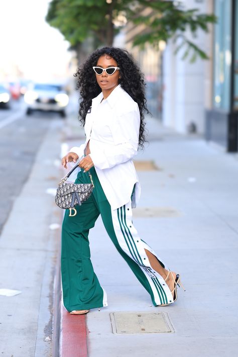 Adibreak Pants curated on LTK Formal Athletic Outfits, Green Sweat Suit Outfit, Smart Tracksuit Outfit, Track Pants And Heels Outfit, Blazer And Track Pants, Oversized Track Pants Outfit, Green Adidas Track Pants Outfit, Adidas Outfit Black Women, How To Style Adidas Pants