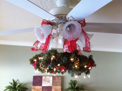 Christmas wreath for ceiling fan! Ceiling Fan Christmas Decorations, Ceiling Fan Christmas Decor Ideas, Christmas Ceiling Fan Decorations, Ceiling Fan Christmas Decor, Christmas Ceiling Decorations Ideas Diy, Ceiling Fan Decor, Christmas Ceiling Decorations Ideas, Fan Wreath, Christmas Chandelier Decor