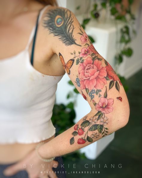 Peonies, Malva Rosa, poppies,butterflies,   ladybugs and strawberries full sleeve tattoo. Botanical tattoo. Color tattoo. Tattoos With Color, Half Sleeve Tattoos Color, Arm Tattoos Color, Watercolor Tattoo Sleeve, Colorful Sleeve Tattoos, Floral Arm Tattoo, Colour Tattoo For Women, Fruit Tattoo, Quarter Sleeve Tattoos