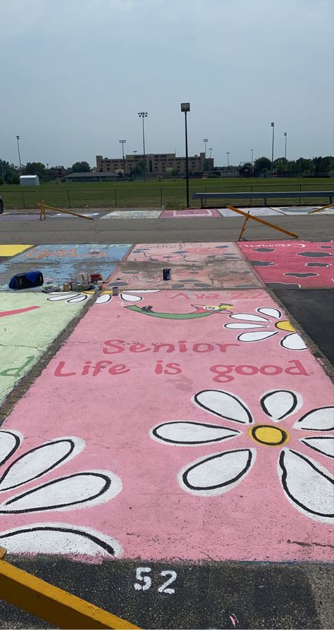 life is good parking spot idea!! Class Of 2024 Parking Spot, Clueless Senior Parking Spot, Parking Spot Chalk, Painting Ideas For Parking Spots, Cute Painted Parking Spots, Senior Painted Parking Spaces Ideas, Parking Spot Chalk Ideas, School Parking Spot Ideas, Chalk Parking Spot Ideas