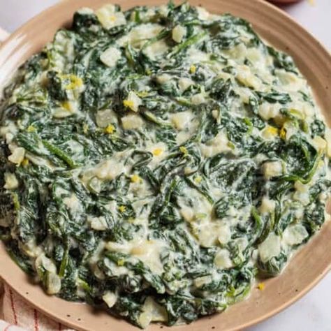 Creamed Spinach | The Mediterranean Dish Spinach With Cream Cheese, Healthy Creamed Spinach, Best Spinach Recipes, Easy Creamed Spinach, Creamed Spinach Recipe Easy, No Heavy Cream, Spinach Dip Easy, Creamed Spinach Recipe, Pan Seared Pork Chops