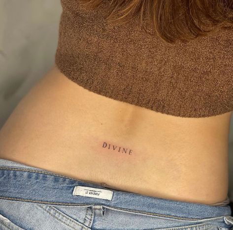 Push Tattoo Ideas, 222 Tattoo Collar Bone, Divine Lower Back Tattoo, Lower Back Word Tattoos, Feminine Small Tattoos, Desire Tattoo, Devine Tattoo, Low Back Tattoo, She Is Art Tattoo