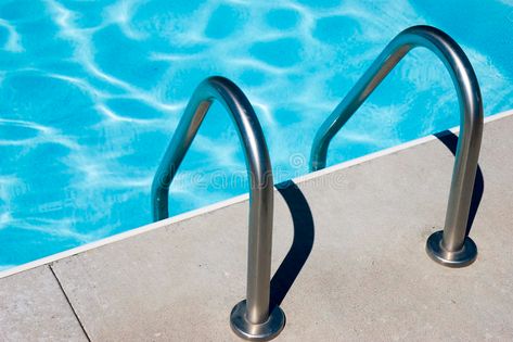 Pool ladder. Stainless steel pool ladder goes down into blue wate stock image Stainless Steel Pool, Steel Pool, Pool Ladder, Blue Water, Stock Images, Home Improvement, Pool, Stainless Steel, Water