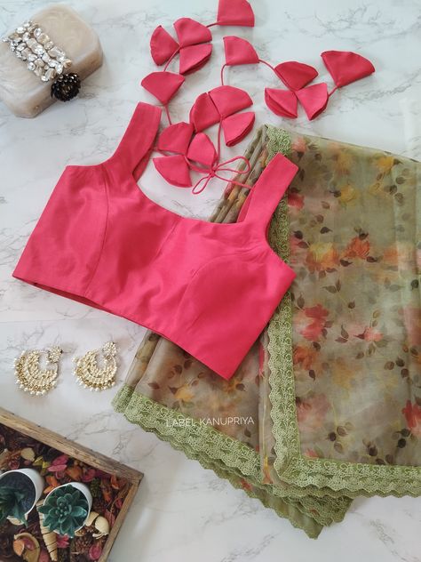 Pretty Organza Saree by Label Kanupriya Shop now on www.labelkanupriya.com E-mail us your queries on labelkanupriya@gmail.com #organzasaree #designersaree #floral #designerblouse Farewell Blouse, Sweta Tiwari, Organza Blouse Designs, Blouse Degine, Vintage Blouse Pattern, Cloth Folding, Saree Jacket Designs, Label Kanupriya, Sleeveless Blouse Designs