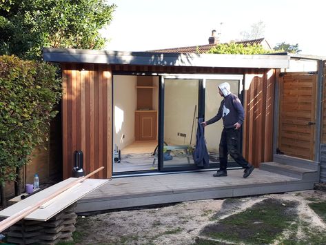 Our client wanted to maximize an existing space in the garden, which was triangular. To make the most out of the space we designed a three-pointed room which was going to be used for a home office and a gym. With this unique design and innovative solution, we turned this dormant space into a highly functional and beautiful garden room. Contemporary Garden Rooms, Garden Cabins, Summer House Garden, Backyard House, Backyard Studio, Backyard Office, Backyard Sheds, Door Open, Garden Rooms