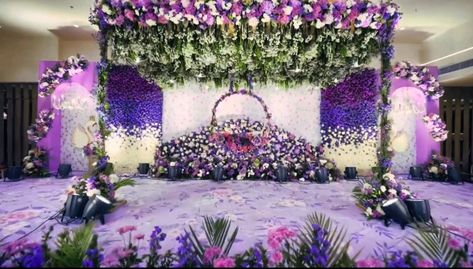 Embrace the regal allure of purple with our enchanting mandap and reception stage decor fit for a fairy tale. 💜 #PurpleDreams #WeddingWonderland Purple Reception, Reception Stage, Reception Stage Decor, Stage Decor, Naming Ceremony, Wonderland Wedding, A Fairy Tale, Event Planner, Fairy Tale