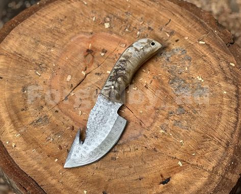 Experience the precision and craftsmanship of our handmade gut hook skinning knife, designed for effortless field dressing and skinning Features: · Hand-forged high-carbon Damascus steel steel blade with razor-sharp gut hook · Ergonomic handle crafted from durable, natural materials BONE · Leather sheath with secure snap closure and belt loop #HuntingLife #HuntingSeason #WildGameHunting #HuntingAdventures #OutdoorLife #HuntingTrip #WildlifeHunting #HuntingGear #HuntingKnives #RifleHunting... Hunting Life, Skinning Knife, Hunting Trip, Wild Game, Hunting Season, Hunting Gear, Hunting Knife, Leather Sheath, Outdoor Life