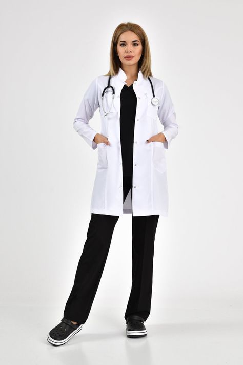 Sleek sellouts! 🤓. Order White Lab Coat, Anti-wrinkle Lightweight Doctor Dentist Surgeon Pharmacist Therapist, Medical Uniform, Classic Lab Coat, JUDGECOLLAR at £37.00 #ScrubForNurses #ScrubSet #MedicalClothes #DentalScrubSet #CustomisedScrubSet #UniformForWomen #MedicalOutfit #ScrubTop #ScrubPants #DoctorScrubUniform Labcoat Doctors Outfit, Lab Assistant Outfit, Doctor Coat Design, Doctor Fashion Women, Doctor Dress Medical, Doctor Outfit Women White Coat, Veterinarian Uniform, Medical Doctor Outfit Women, Doctor Uniform Woman