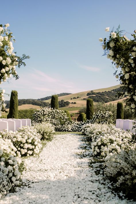 Destination Wedding Planner Andrea Eppolito designed a luxe wedding with white roses at Viansa Winery in Sonoma, CA for NFL Player Johnathan Hankins and his wife, Mahsa Zare. Photo by Rene Zadori. Italian Classic Wedding, Roman Inspired Wedding, Winery Wedding Aesthetic, Viansa Sonoma Wedding, Random Wedding Ideas, Viansa Wedding, Floral Ceremony Backdrop, Wedding Venues Ideas, Winery Wedding Ideas