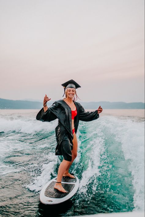 Wakesurfing Graduation Pictures, Senior Pics Ideas Unique, Wake Surfing Graduation Pictures, Senior Boat Pictures, Wake Surfing Senior Pictures, Mountain Graduation Pictures, Surf Senior Pictures, Cap And Gown Beach Pictures, Graduation Picture Outfit Ideas Senior Pics