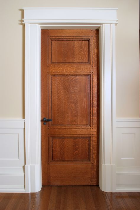 Custom 3 panel Quarter Sawn White Oak interior door with craftsman style painted door casing and custom base blocks. White Door Frame, Fluted Trim, Craftsman Style Trim, Baseboard Styles, Craftsman Trim, Door Frame Molding, Victorian Room, Oak Interior Doors, Trendy Door