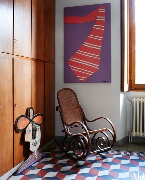 Baj’s The Large Tie hangs above an antique Thonet rocking chair | archdigest.com Art Nouveau Desk, Bag Chairs, Italian Villa, Cool Chairs, Large Living Room, Architectural Digest, Bean Bag, Living Room Wall, Living Room Chairs