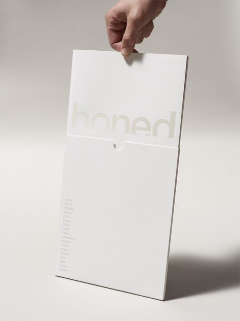 White foil on white _ Honed white _ Ammunition Folder Design Layout, Folder Design Inspiration, Brochure Inspiration, White Foil, Editorial Design Layout, Graphic Design Brochure, Brochure Paper, Leaflet Design, Presentation Folder