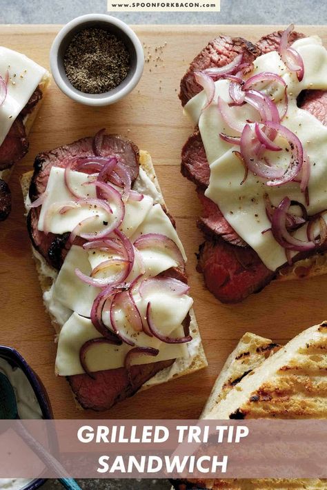 Our recipe for Grilled Tri Tip Sandwiches is so easy and crazy delicious! Filled with juicy and flavorful grilled tri tip, melted cheese, thinly sliced red onions, and sandwiches between two thick slices of ciabatta, it's one of our favorite sandwiches! #dinner #sandwich #grilling #summer #recipe Grilled Tri Tip, Tri Tip Sandwich, Tenderloin Sandwich, Dinner Sandwich, Pork Tenderloin Sandwich, Creamy Horseradish Sauce, Oven Baked Ribs, Spoon Fork Bacon, Baked Ribs