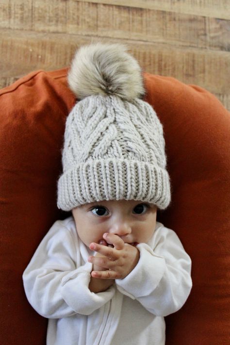 Baby wearing cream colored fur pom pom beanie Baby Bear Onesie, Baby Denim Jacket, Knit Pom Pom Hat, Fur Pom Pom Beanie, Pom Pom Baby, Baby Bamboo, Knotted Beanie, Wooly Hats, Toddler Accessories